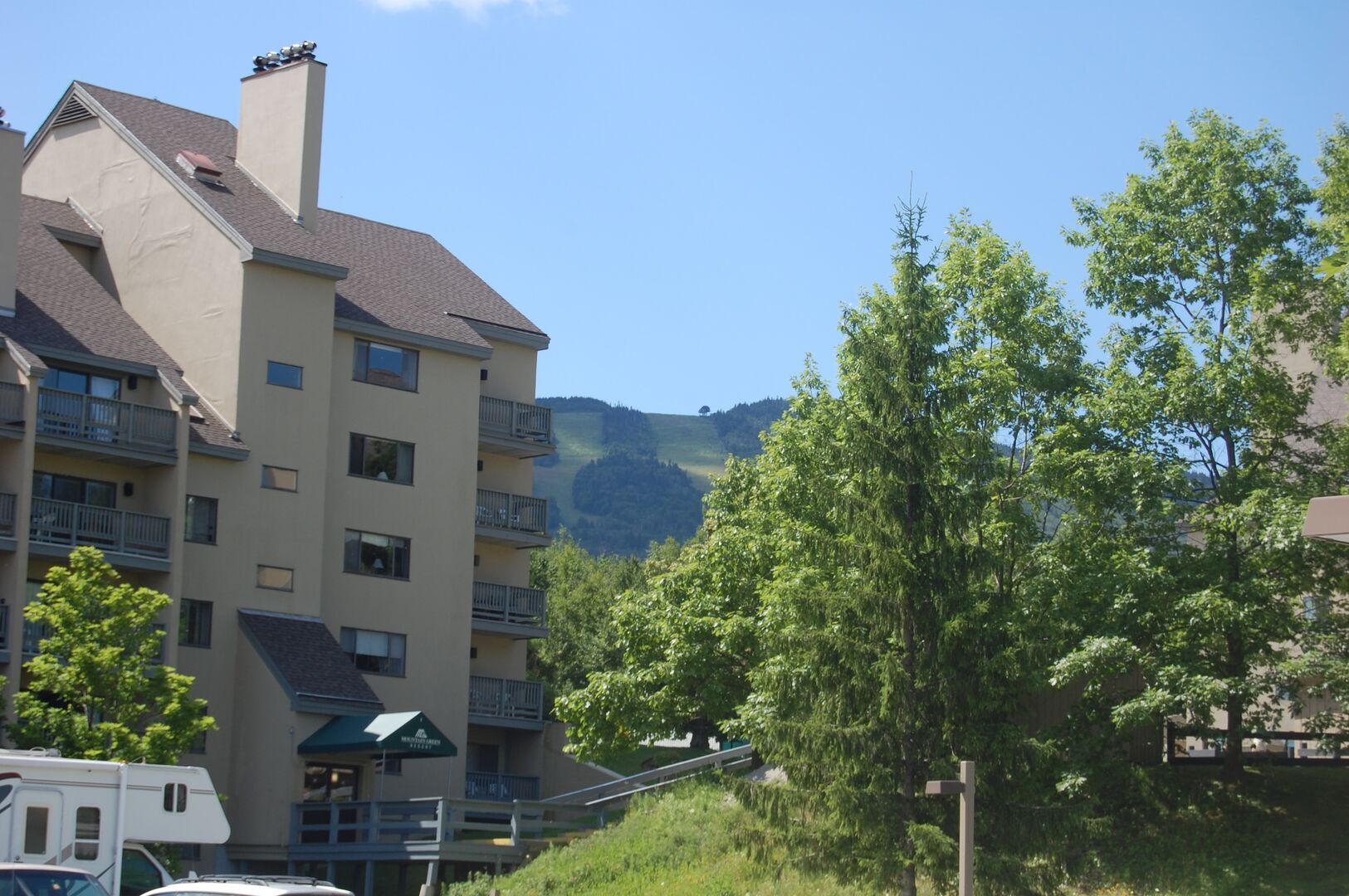View of building 1 and Killington in the summer