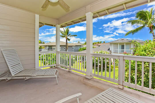Upper balcony of this condo for rent in Ko Olina Hawaii, with porch chairs.