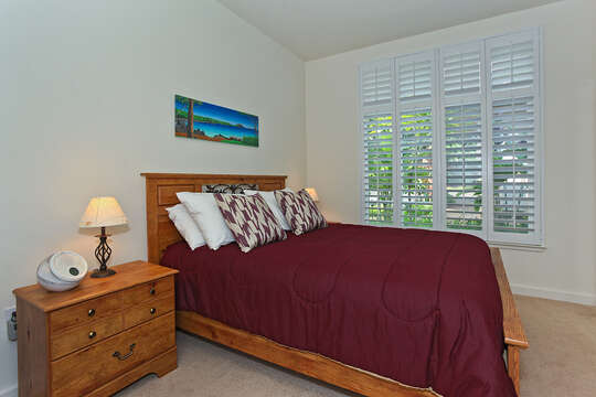 Bedroom Features Plenty of Natural Light Coming in From Windows.