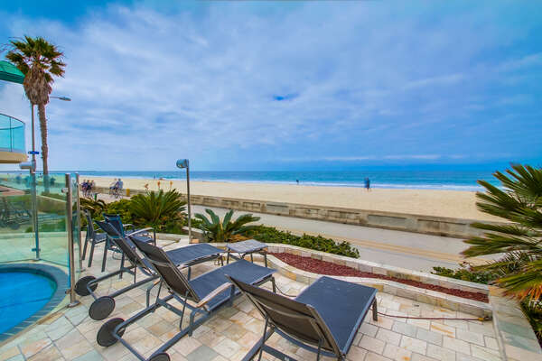 Guests Can Enjoy a Oceanfront Shared Patio.