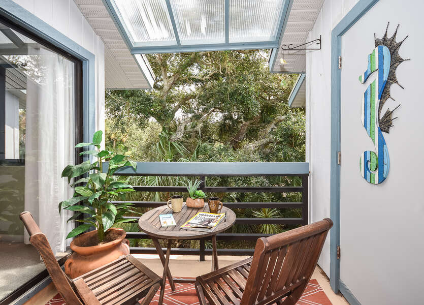 Enjoy plush tropical landscaping from your private patio.