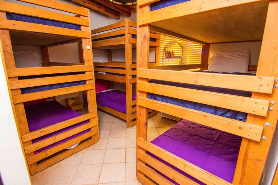 Kids can enjoy a big sleepover in this 3-bunk room that sleeps 9!