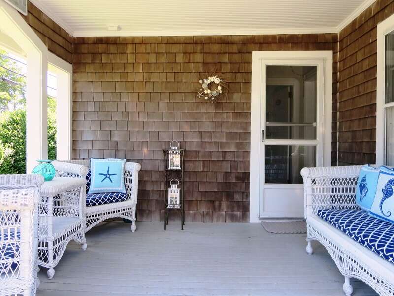 Walk out the front door to a cozy porch!  388 Main Street Chatham Cape Cod New England Vacation Rentals