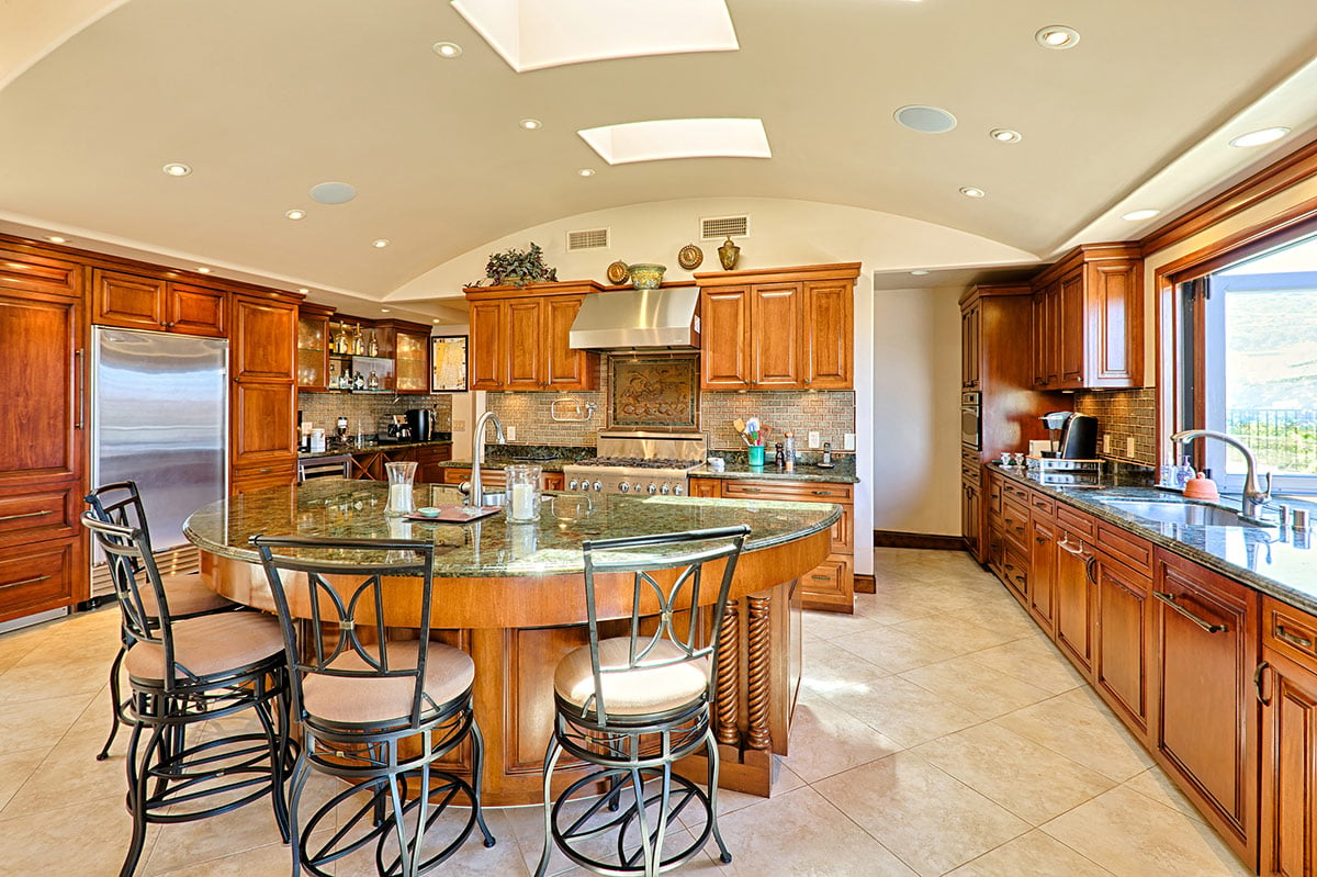 Gourmet chef's kitchen with granite counters and every amenity and appliance