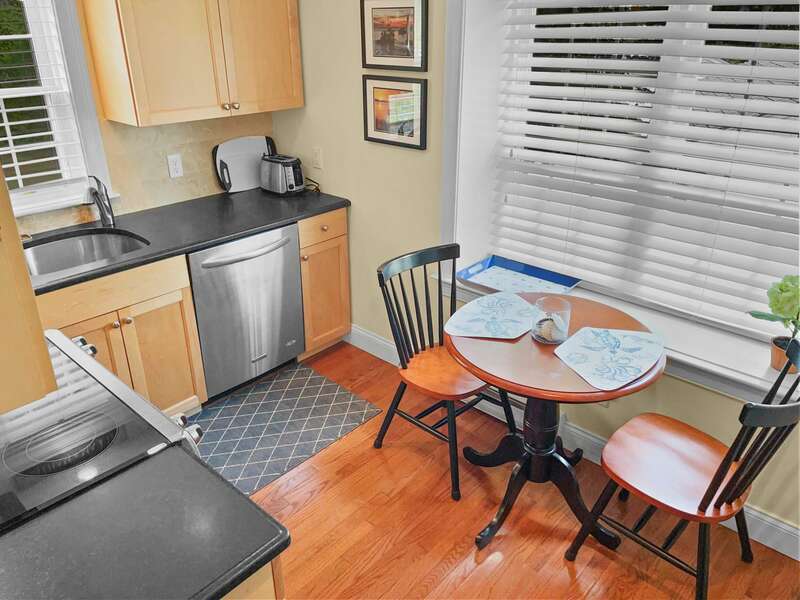 Sip coffee and chat in the kitchen before starting your day - 109 Misty Meadow Lane #1 Chatham Cape Cod New England Vacation Rentals