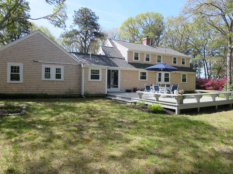 Exterior back with great yard and deck! - 4 Long Pond Drive Harwich Cape Cod New England Vacation -#BookNEVRDirectCapeRetreatRentals