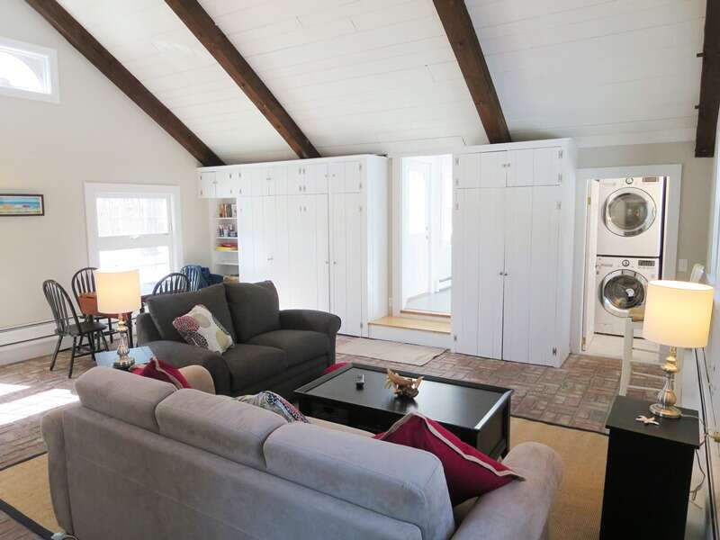 Lots of seating. Central air and ceiling fan. Washer/dryer in half bath off of this room - 4 Long Pond Drive Harwich Cape Cod New England Vacation Rentals-#BookNEVRDirectCapeRetreat