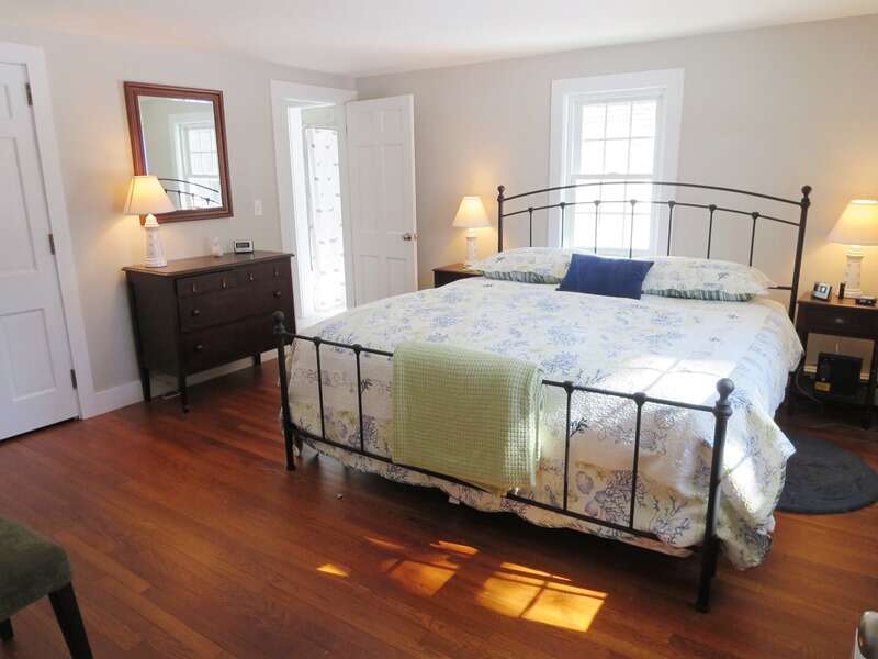 1st Floor bedroom with a King bed and an en suite bath - 4 Long Pond Drive Harwich Cape Cod New England Vacation Rentals-#BookNEVRDirectCapeRetreat