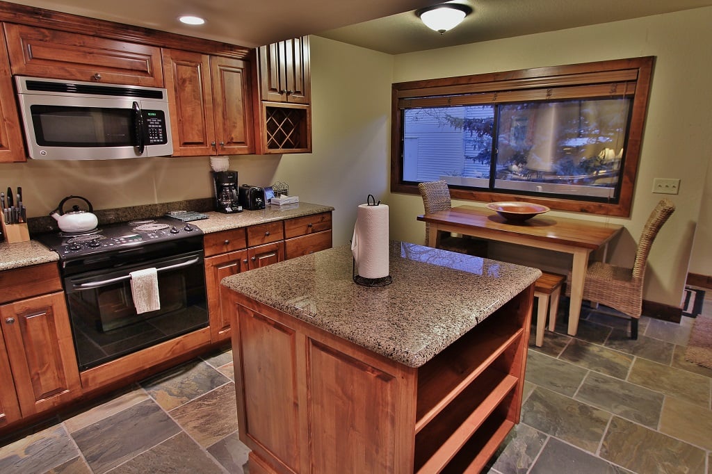 Kitchen with stainless steel appliances and granite counter tops in Park City Racquet Club Village - Park City