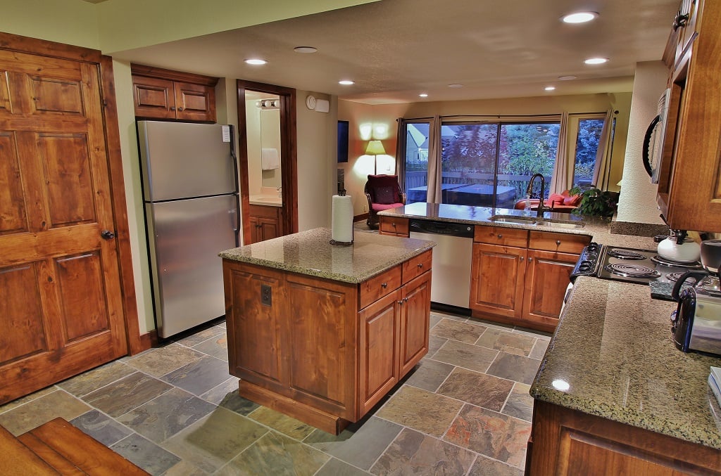 Kitchen with stainless steel appliances and granite counter tops in Park City Racquet Club Village - Park City
