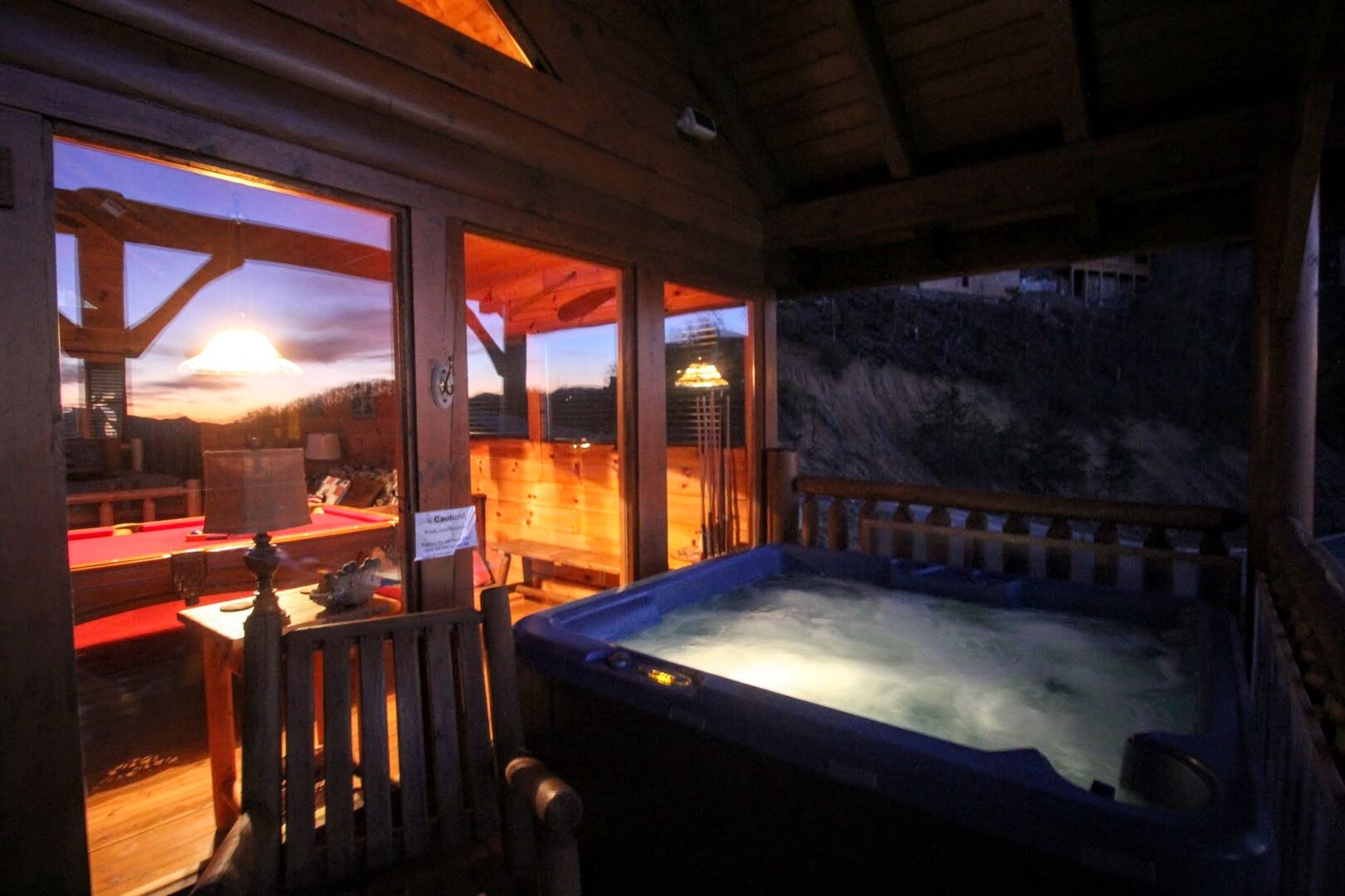 PICTURE YOURSELF SITTING IN THIS WONDERFUL HOT TUB ON THE SECOND DECK, LOOKING AT A GORGEOUS VIEW, WHICH AT SUNSET, REFLECTS INTO THE WINDOWS BEHIND YOU AS IN THE PICTURE!  YOU REALLY CAN'T GET MORE RELAXING THAN THIS!
All photos were taken by Joni - owner