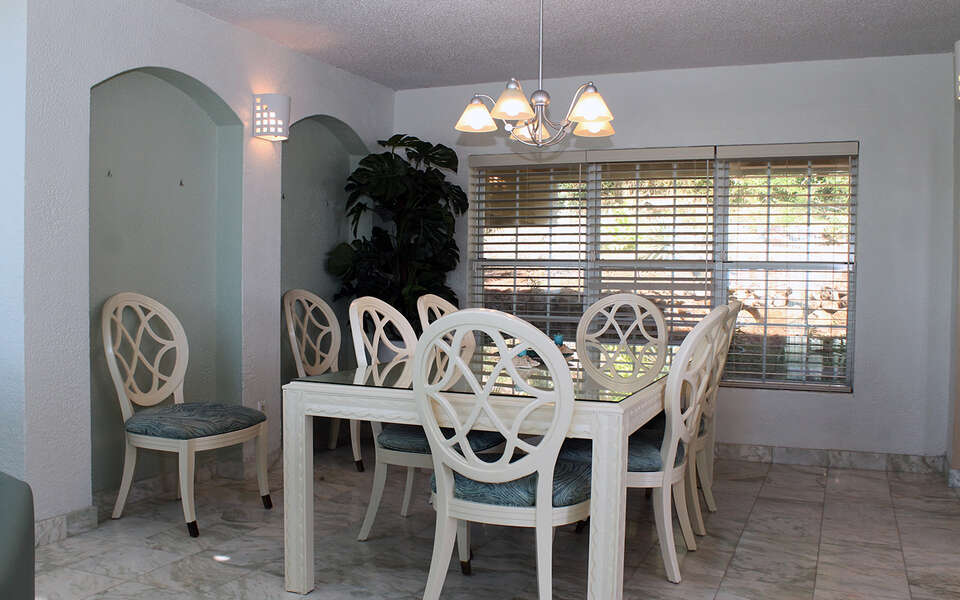 Dining area seats up to 8 guests with Window
