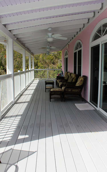 Shaded deck with fans and well appointed furniture