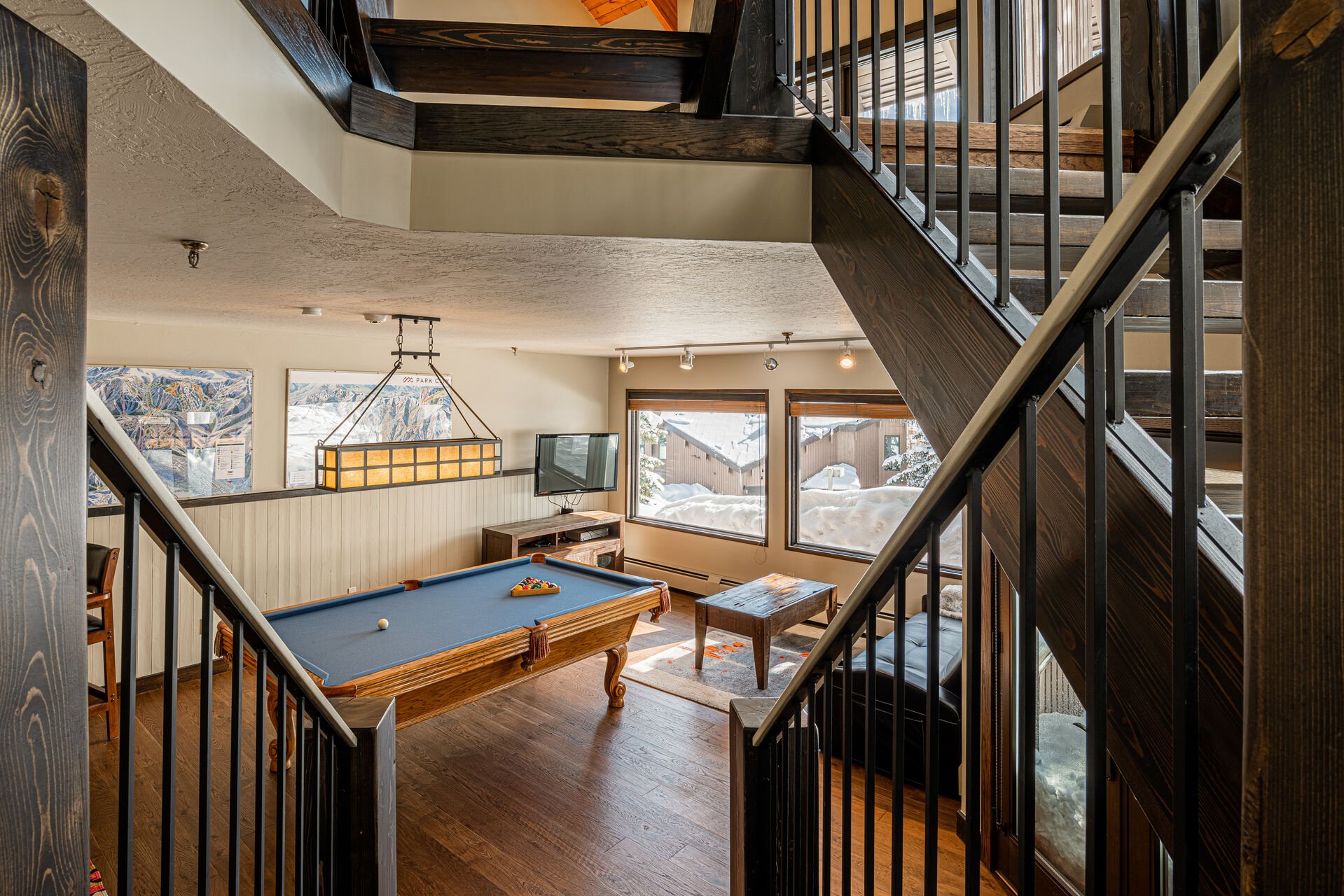 Lower Level Game Room with Pool Table, TV, and Futon