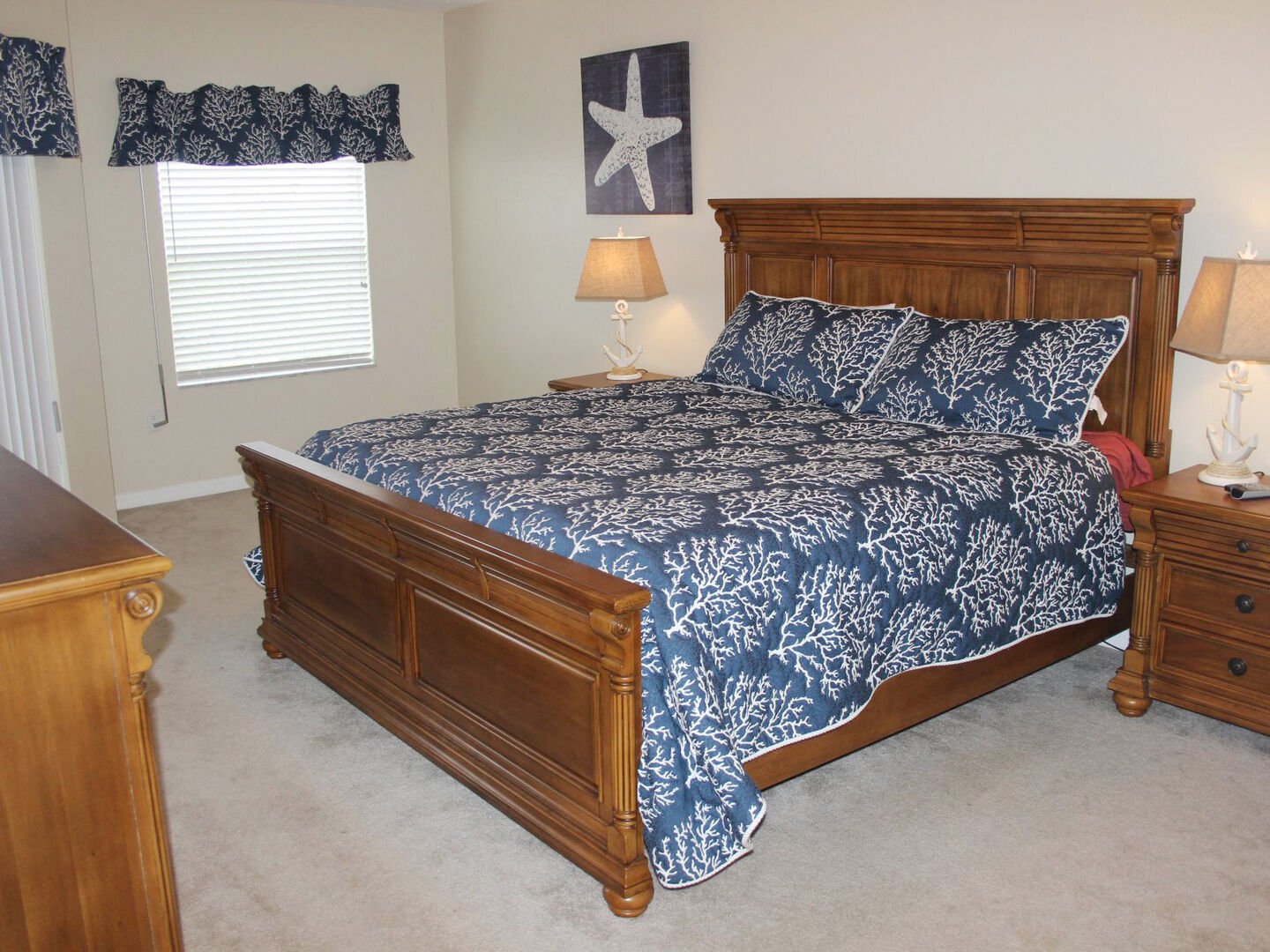 Roomy master bedroom with king size bed and private bath.
