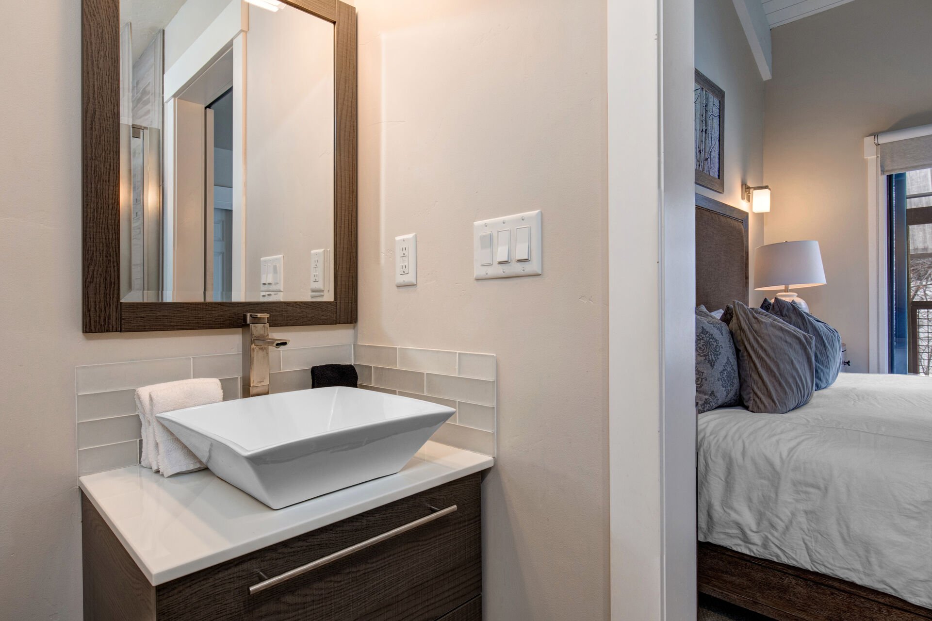 Main level Master Bathroom 2 with rainwater tile/stone shower and raised vessel vanity