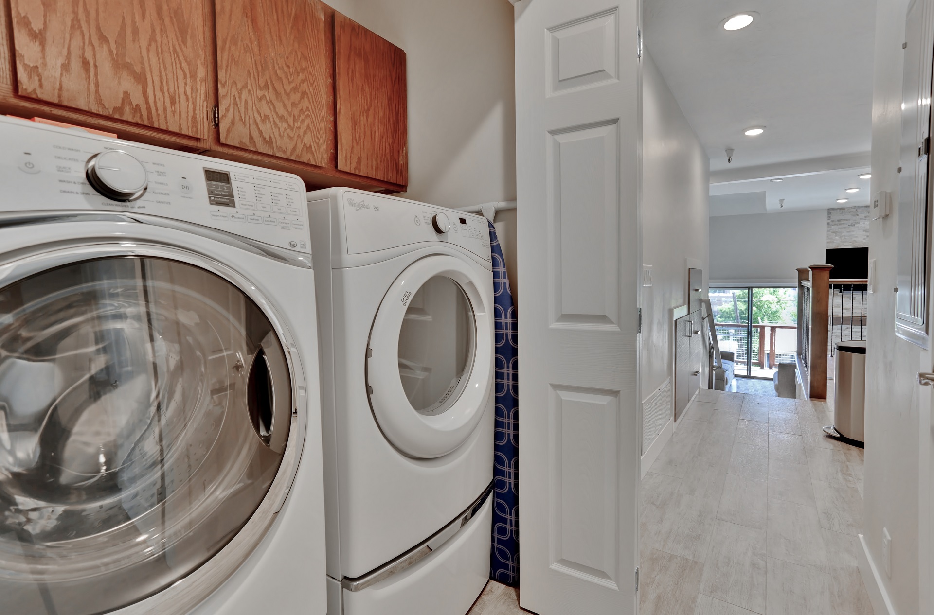 Full size Whirlpool Duet washer and dryer on main level