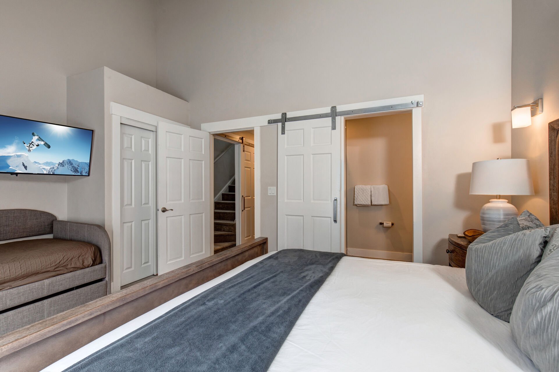 Main level master bedroom 2 with king bed, twin day bed with twin trundle and full private bathroom