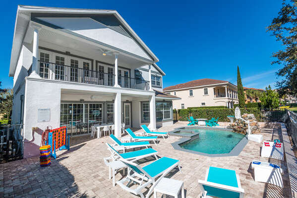 Relax poolside and soak up the Florida sunshine by your very own private pool and spillover spa