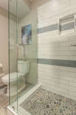 Guest Bathroom- Highly updated. Featuring a Stand Alone Shower