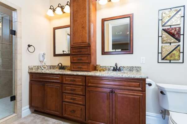 Master suite bathroom 1 has plenty of cabinet space for storage and features double sinks