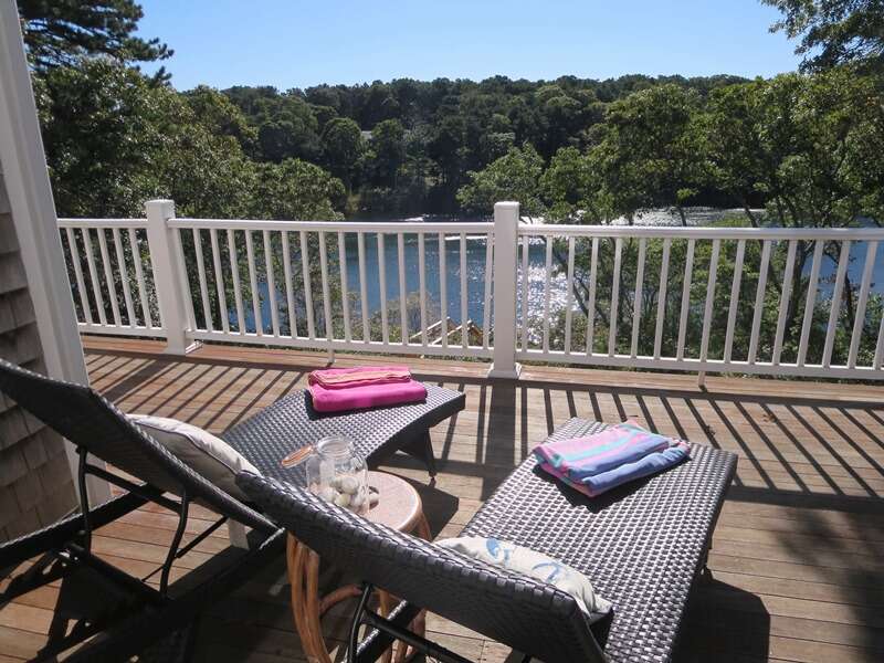 Lounge on the deck and enjoy summer sun and water view! - 151 Sky Way Chatham Cape Cod New England Vacation Rentals