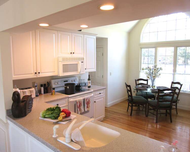 Open kitchen with eat in breakfast nook - 151 Sky Way Chatham Cape Cod New England Vacation Rentals