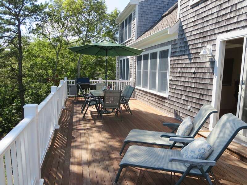 The expansive deck offer plenty of seating including 2 lounge chairs - 151 Sky Way Chatham Cape Cod New England Vacation Rentals