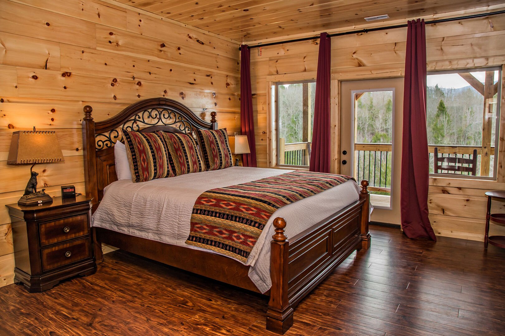 Large Wooden Bed in Bedroom.