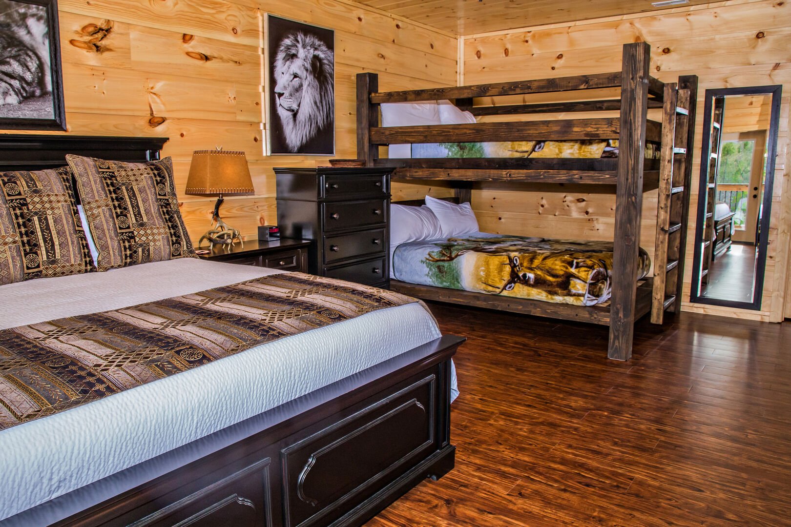 Bedroom Features a Wooden Bed and Bunk Bed.