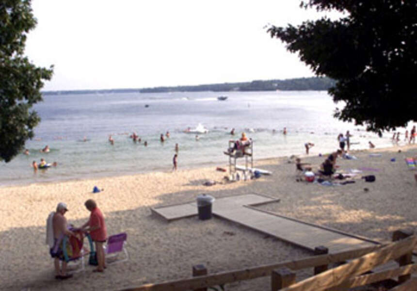 Lake Waquaquet, public beach area just a short drive away! Beach pass included!
