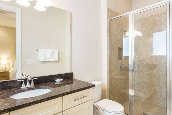 En-suite with granite counter tops and walk in shower