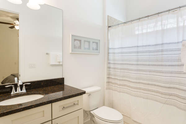 En-Suite with granite counter tops and tub/shower combination