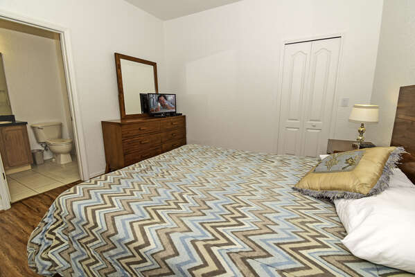 Master bedroom 2 showing flatscreen and en-suite bathroom