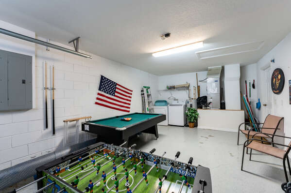Games room showing pool table and foosball