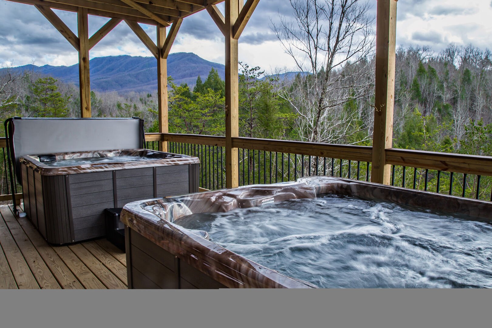 Two Hot Tubs in the Upper-Level Deck.