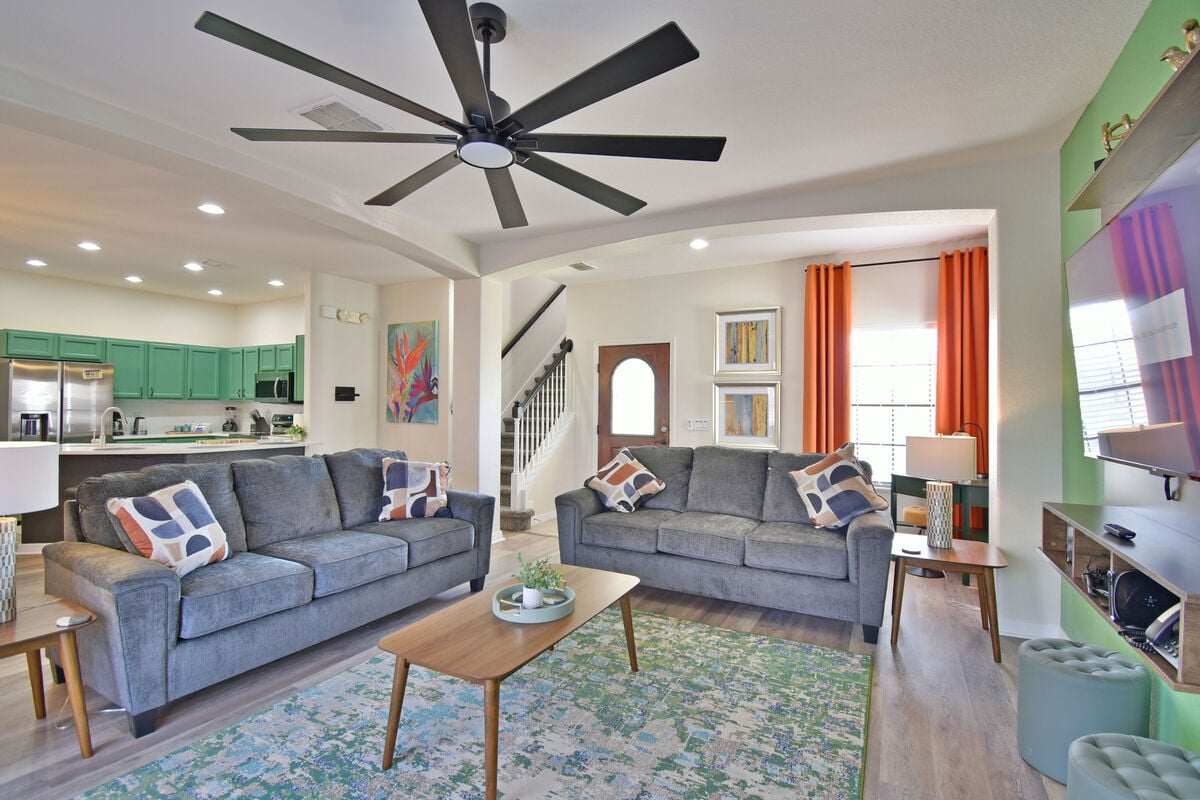 living room showing seating and front entrance