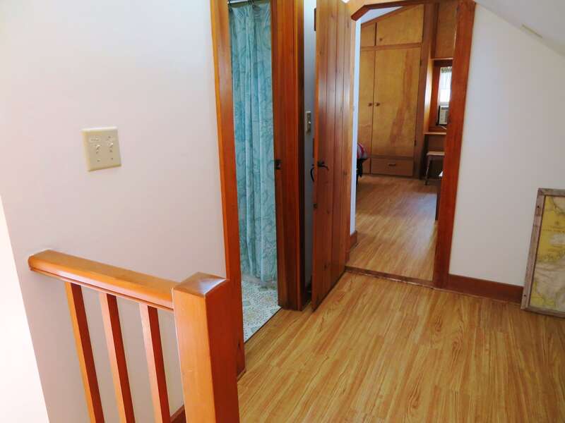 2nd floor-Landing at top of stairs - bathroom to the left Entry to Bedroom 3 and 4 straight ahead- 299 Cranberry Lane North Chatham Cape Cod New England Vacation Rentals  #BookNEVRDirectBarefootHome