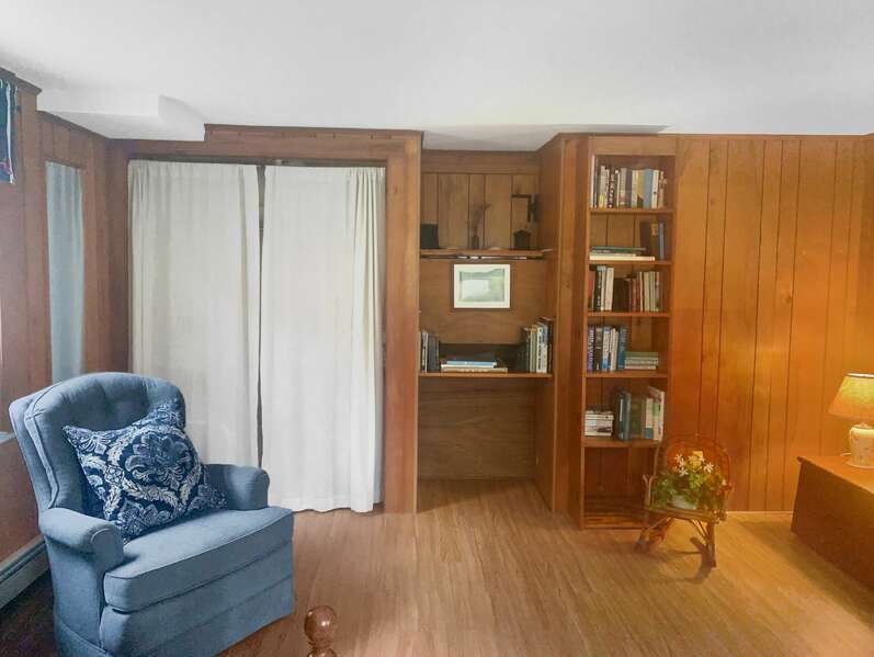Bedroom #2 Main Floor Double Bed and twin bed chair bookshelf and closet- 299 Cranberry Lane North Chatham Cape Cod New England Vacation Rentals  #BookNEVRDirectBarefootHome