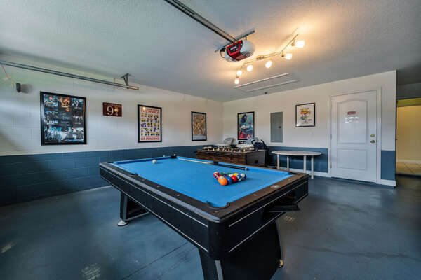 Games room showing air hockey, foosball and pool table