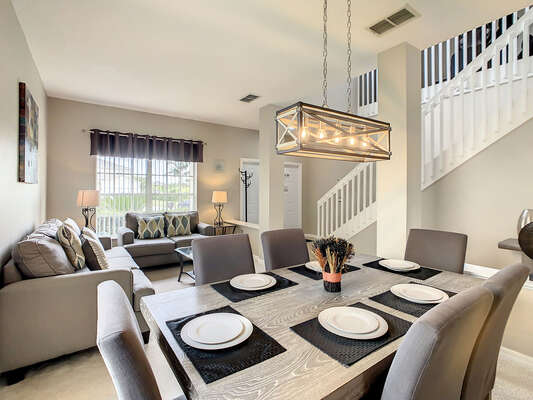 Dining table  overlooking the family seating area and entry