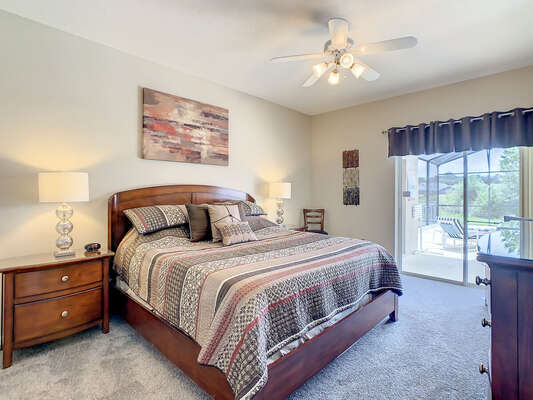 Master bedroom is located on the main floor with pool access