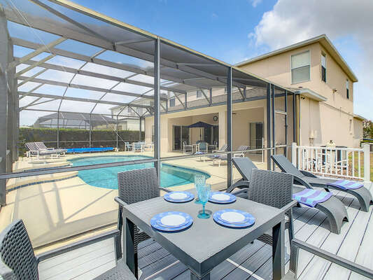 Extended sun deck with outdoor seating and lounges.