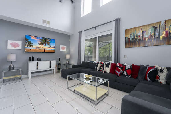 Living room sectional showing TV.