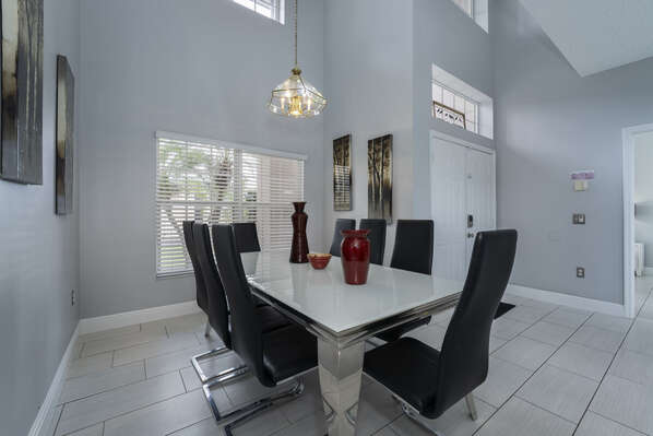 Dining room showing table with 8 seats