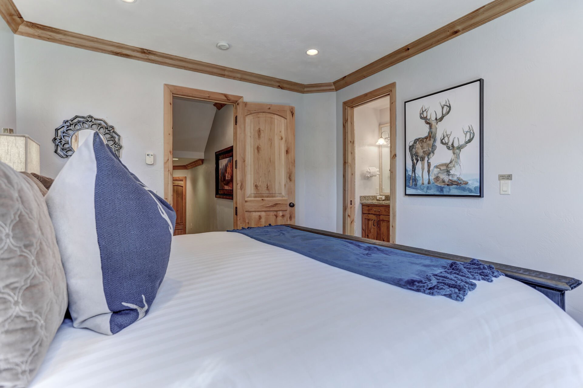 Grand master bedroom with king bed, fireplace, LED Smart TV, private deck & full bathroom