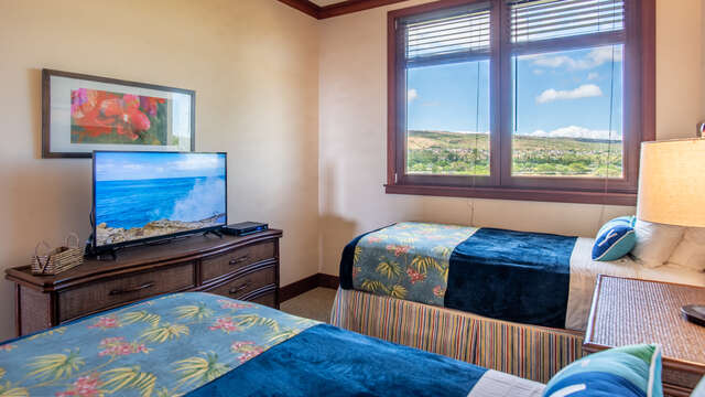 Third Bedroom with 2 Twin Beds, TV, and Beautiful Views inside our Beach VIllas OT-505
