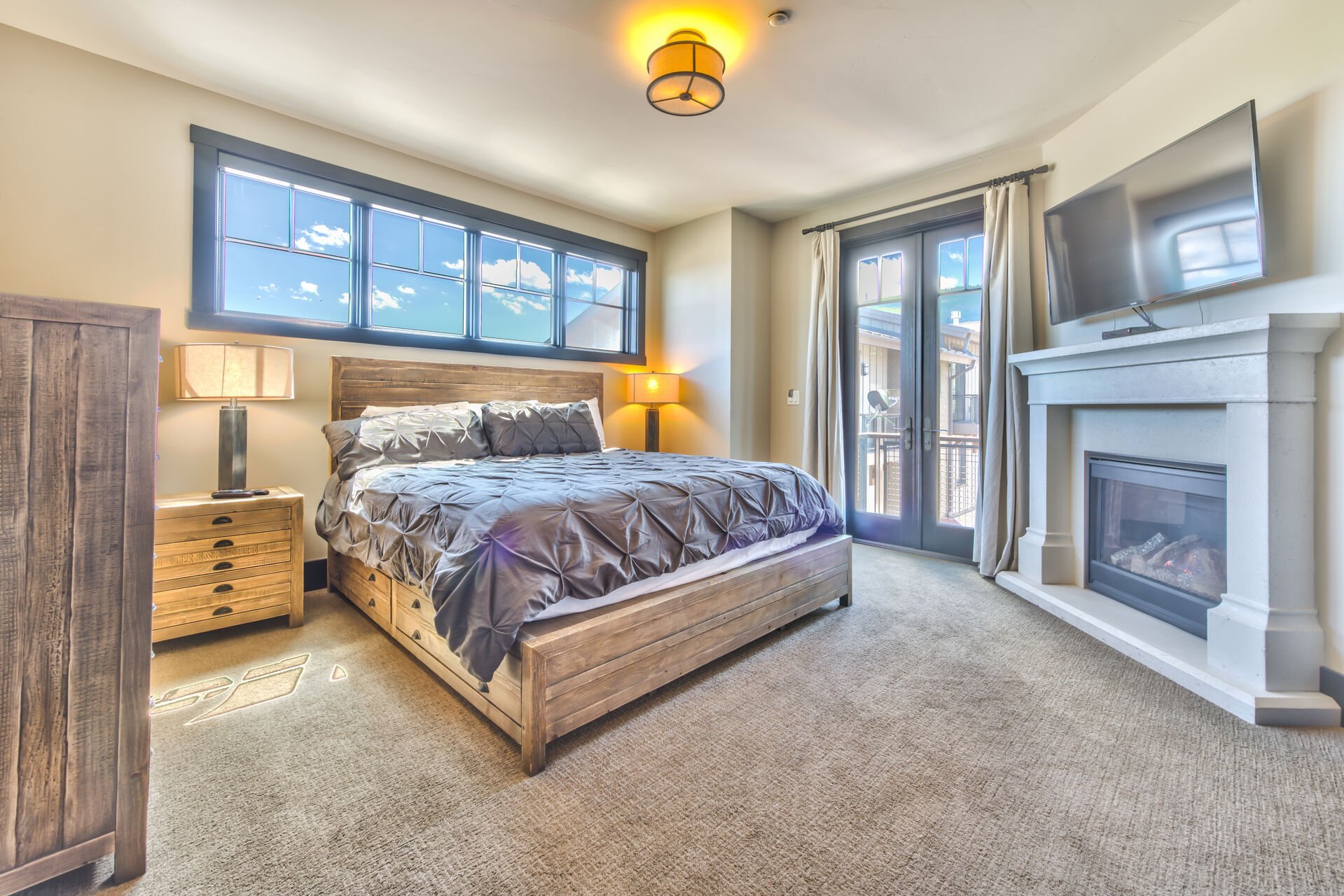 Master Bedroom with King Bed, Gas Fireplace and 40