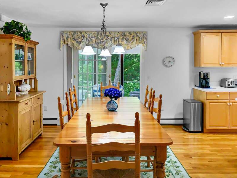 Dining area off of the kitchen offers easy access to screened in porch - 30 Cockle Cove Road Chatham Cape Cod New England Vacation Rentals