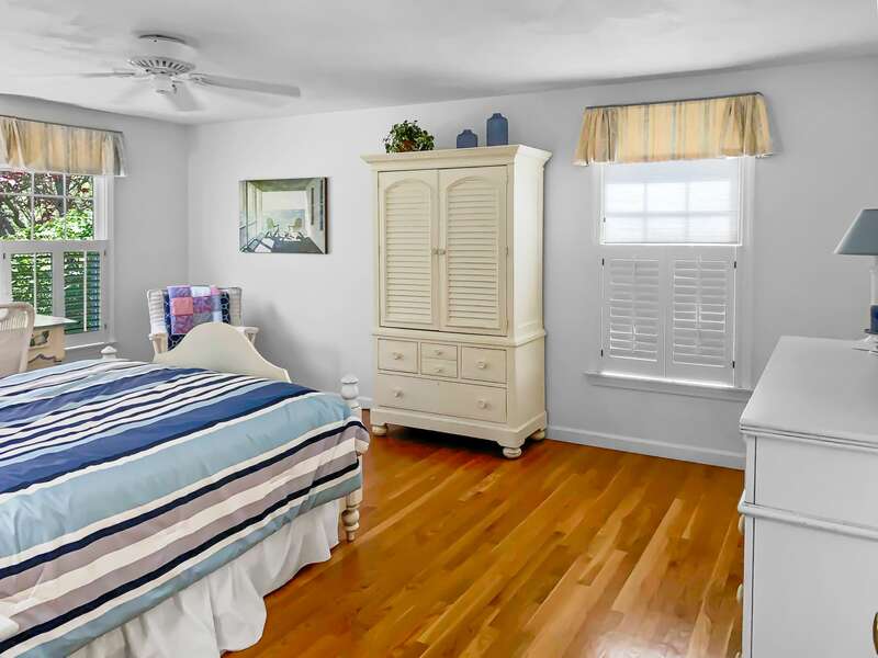 Bedroom #1,  master bedroom with a Queen bed, flat screen TV, and full en suite bath - 30 Cockle Cove Road Chatham Cape Cod New England Vacation Rentals